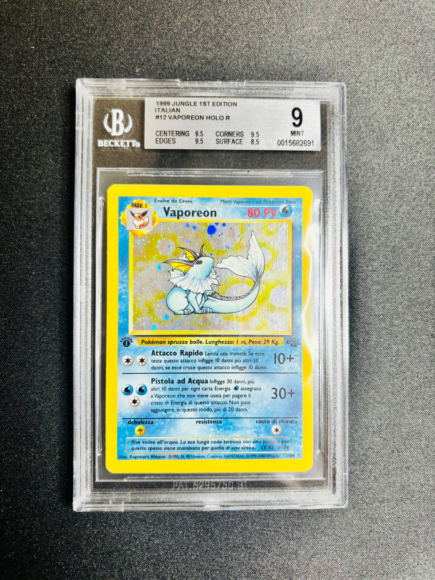1999 JUNGLE 1ST EDITION ITALIAN #12 VAPOREON HOLO R BGS 9